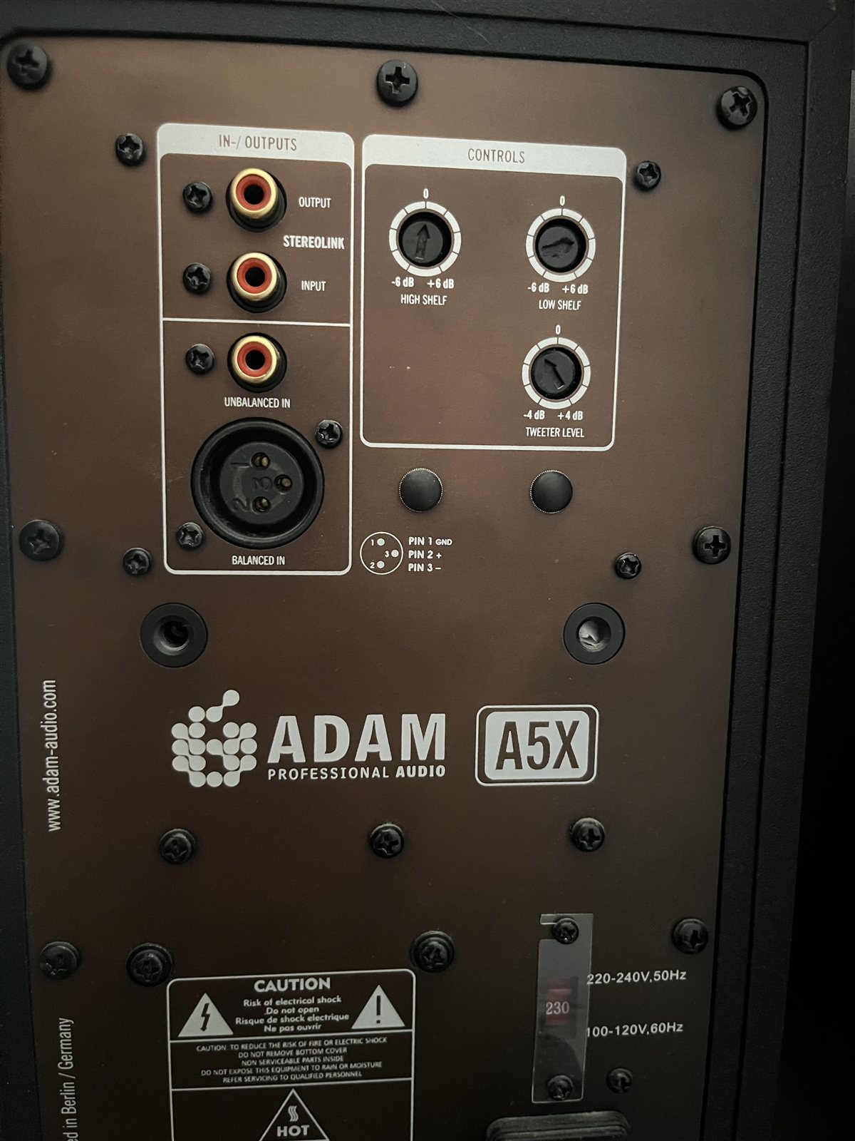 Rear connection panel of an ADAM A5X active studio monitor.