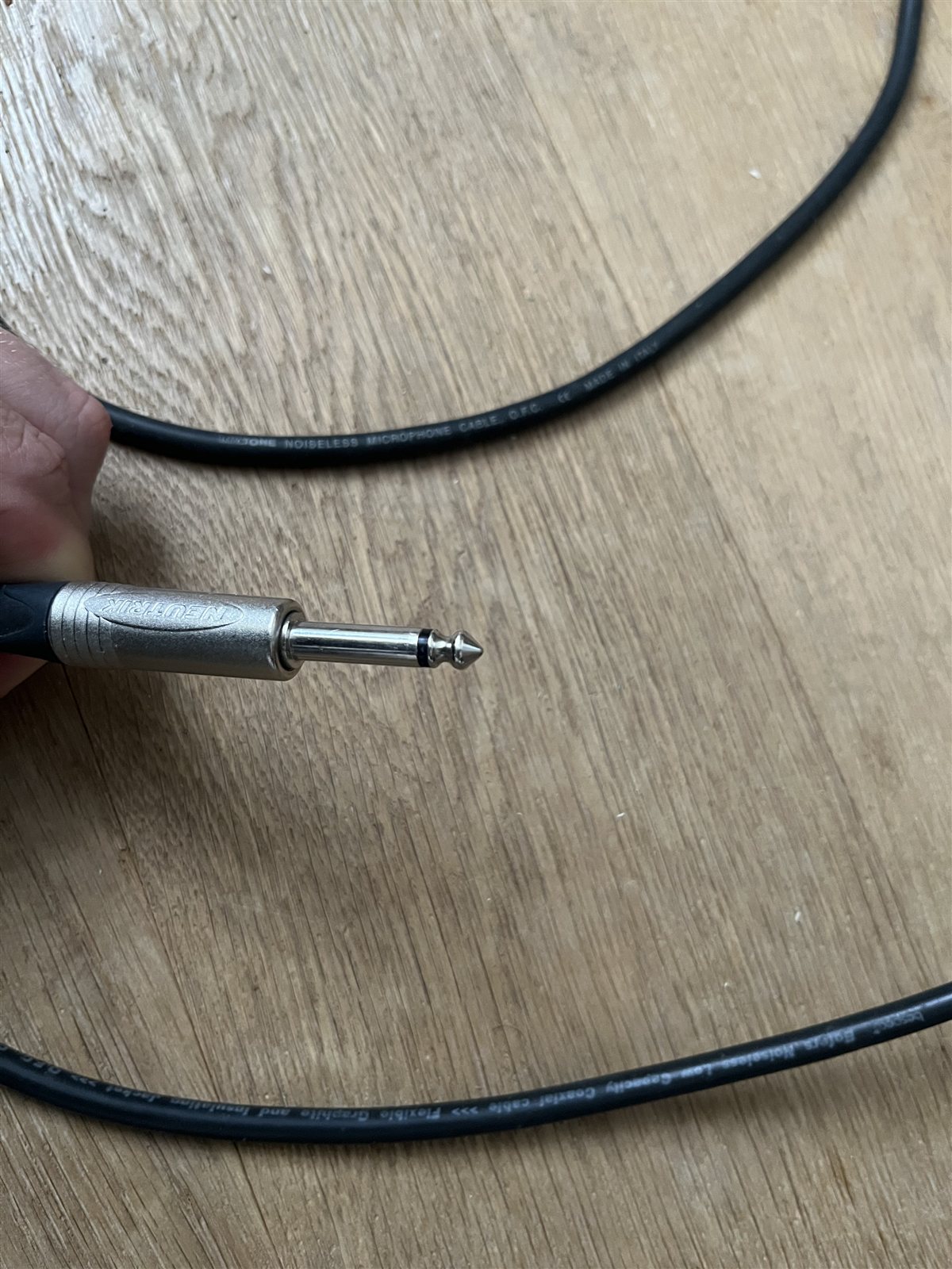 Close-up of a quarter-inch studio cable connector.