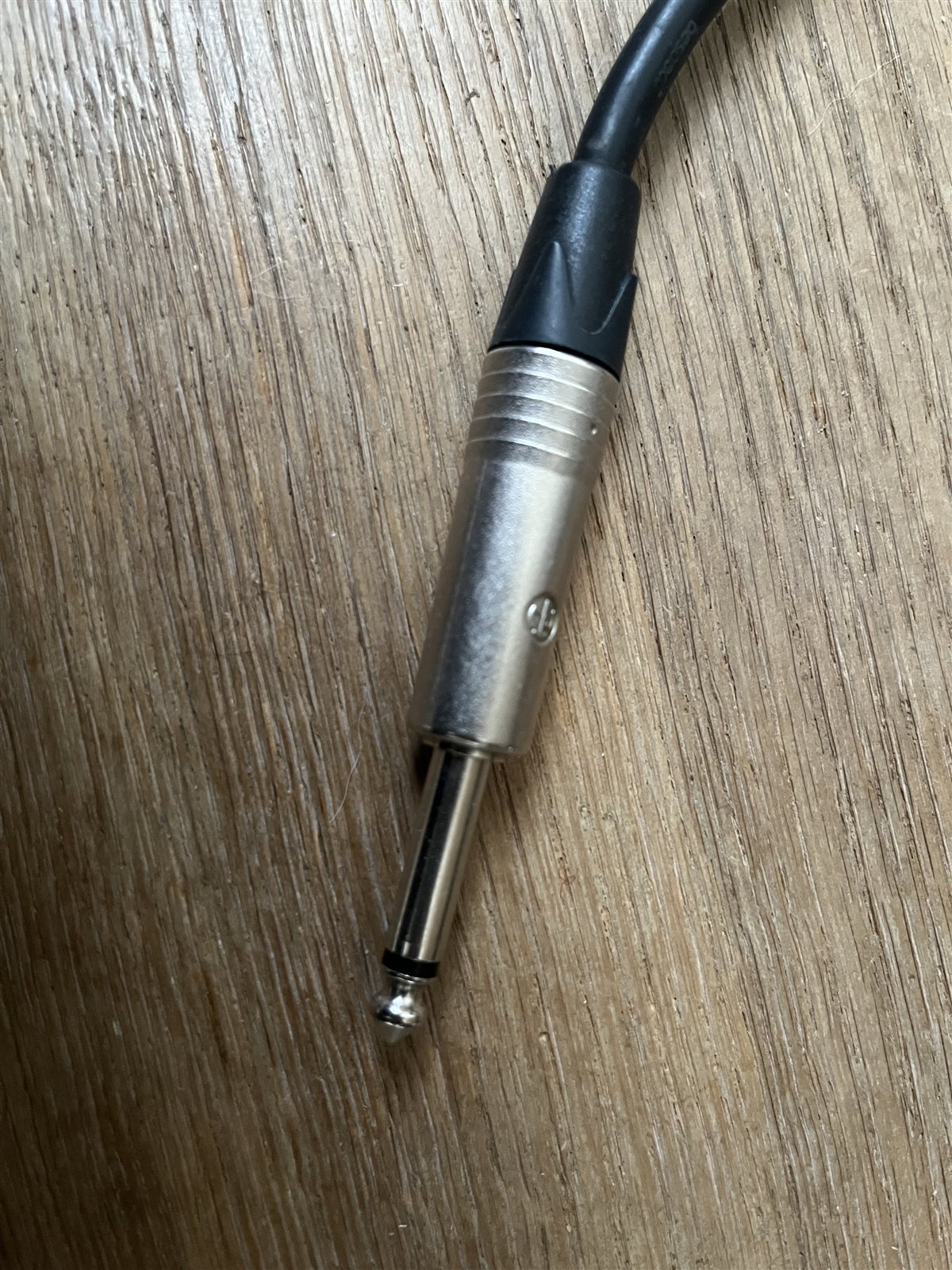 Quarter-inch line cable used in a compact home studio.