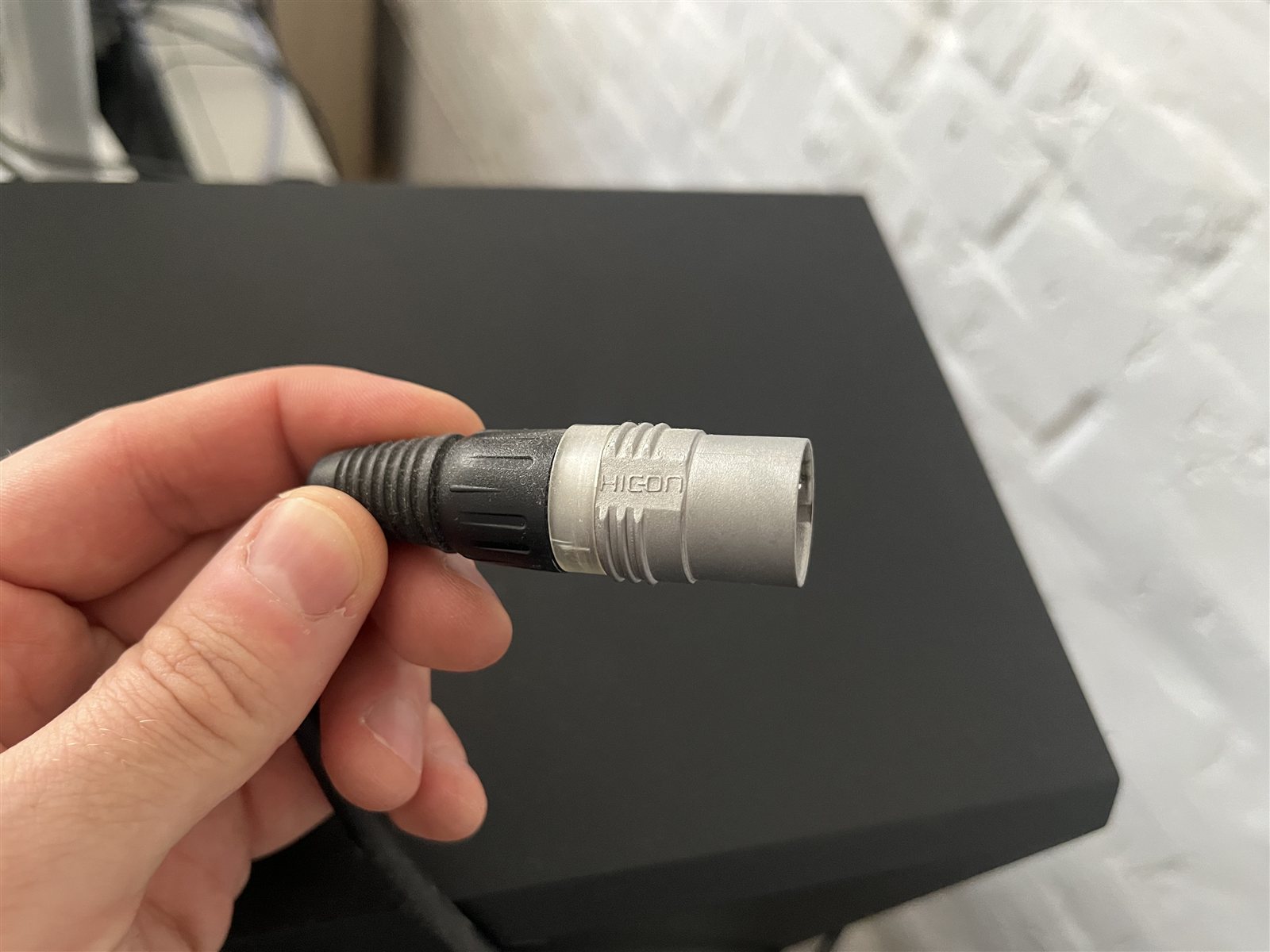 XLR cable connector used for a microphone or balanced audio connection.