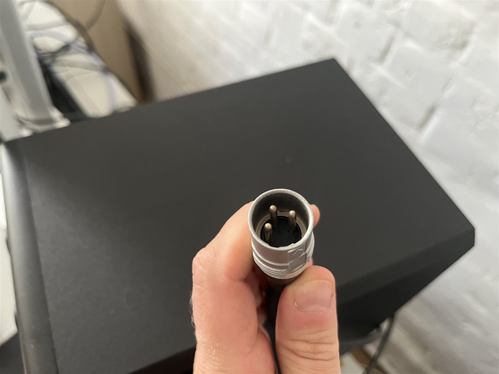 XLR microphone cable connector in a home studio.